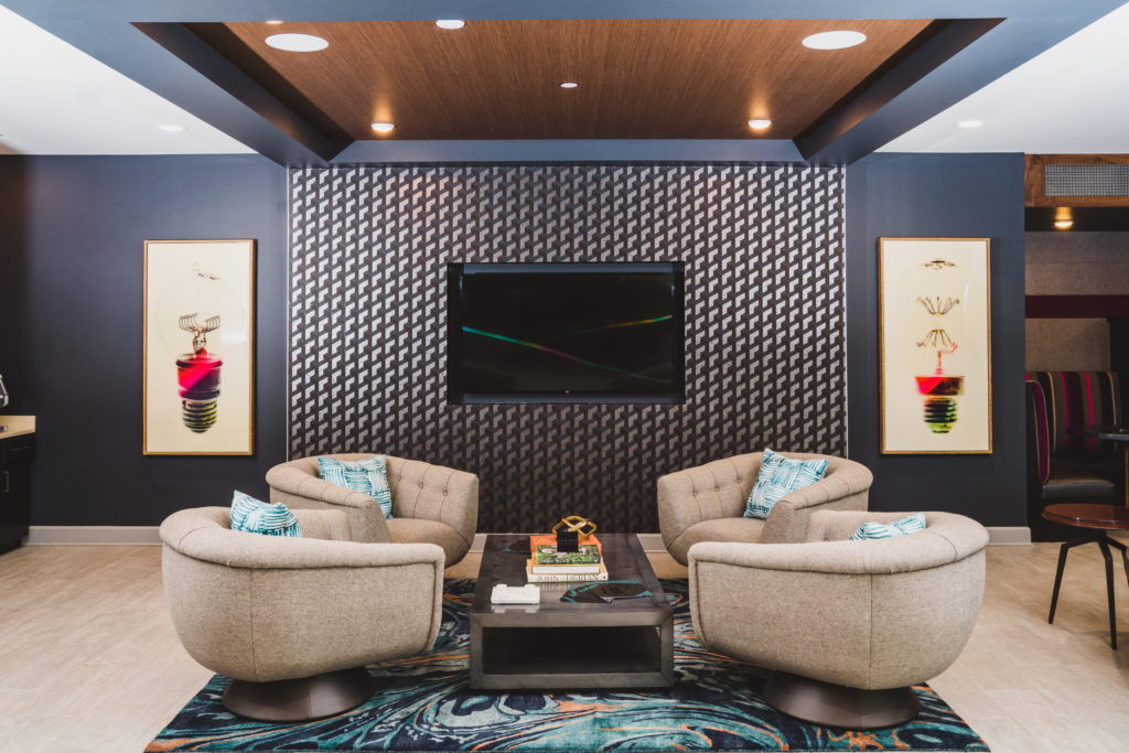 Social Space with Private Seating and HD TV's - Indoor Fun for Everyone at Alexan Buckhead Village
