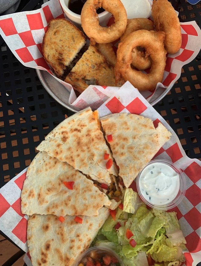 Cheese Quesadilla with chicken, Onion rings, prime rib sandwich - pic by Grace Y. on Yelp - Elbow Room near Alexan Buckhead Village